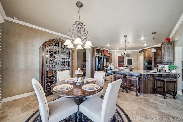 dining area with stone finish floor, baseboards, an inviting chandelier, and ornamental molding