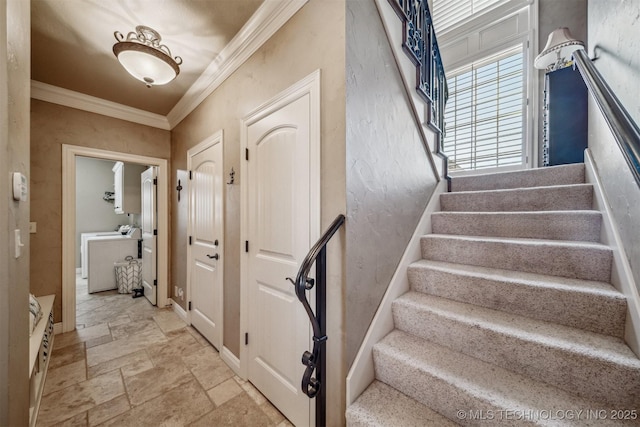 7161 Hackberry Rdg, Owasso, OK 74055 - stairway featuring washer / dryer, ornamental molding, stone tile flooring, and baseboards