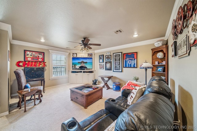 living room featuring visible vents, carpet floors, baseboards, and crown molding