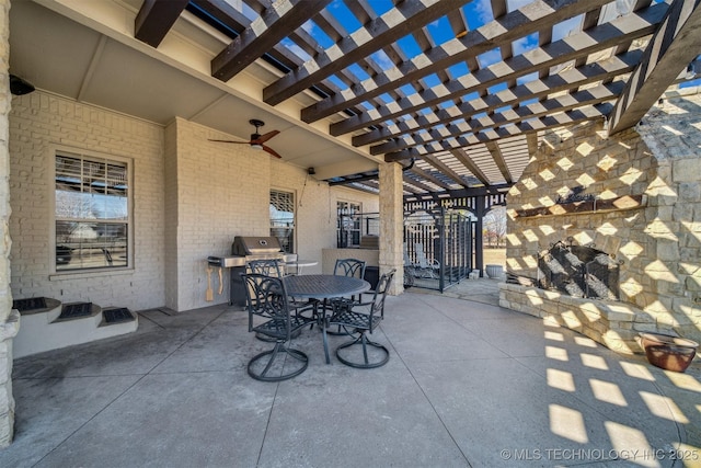 view of patio / terrace featuring outdoor dining space, exterior kitchen, area for grilling, a fireplace, and a pergola