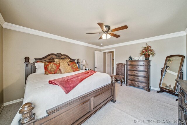 bedroom featuring light colored carpet, a ceiling fan, baseboards, and ornamental molding