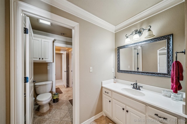 bathroom with tile patterned floors, toilet, ornamental molding, baseboards, and vanity