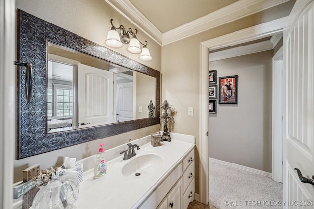 bathroom featuring vanity, baseboards, and ornamental molding