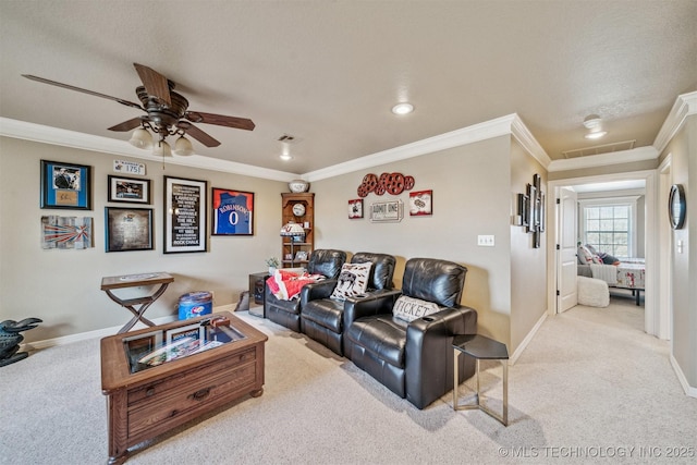 carpeted living room featuring crown molding, baseboards, visible vents, and ceiling fan