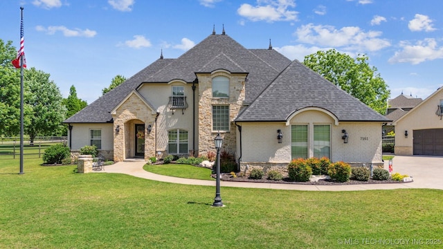 7161 Hackberry Rdg, Owasso, OK 74055 - french provincial home featuring stone siding and roof with shingles