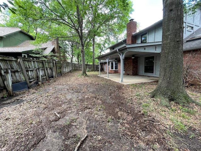 view of yard featuring a fenced backyard and a patio area