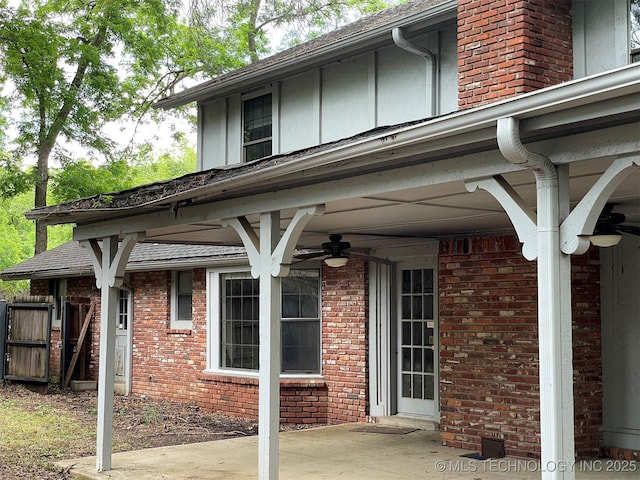 exterior space with ceiling fan