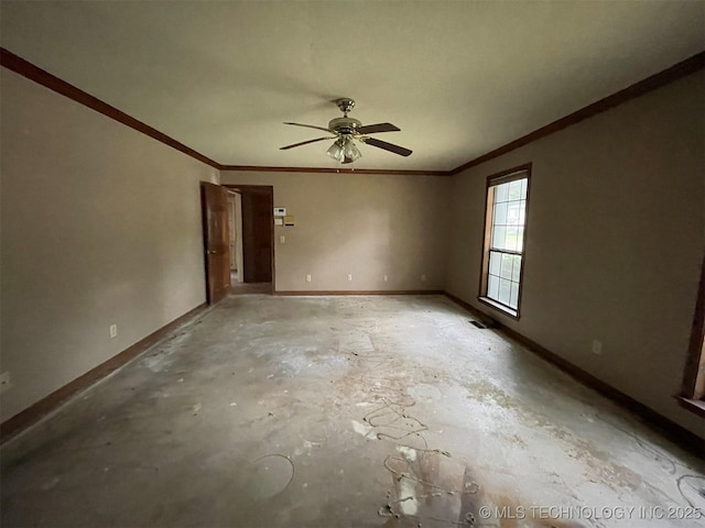 spare room with baseboards and unfinished concrete floors