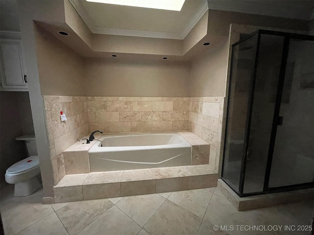 full bathroom with a garden tub, a stall shower, and toilet