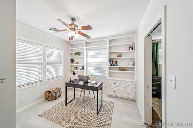 office area with light tile patterned floors, visible vents, baseboards, and ceiling fan