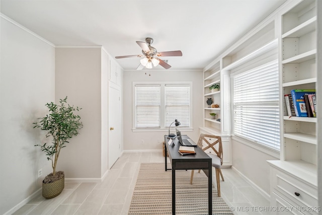 office area featuring a wealth of natural light, baseboards, and a ceiling fan