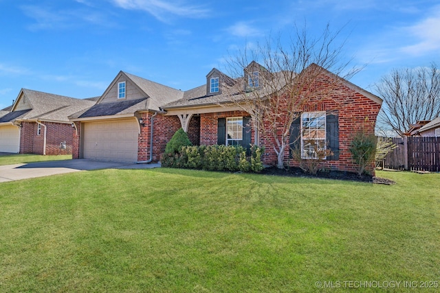 view of front of home featuring driveway, brick siding, a front lawn, and fence