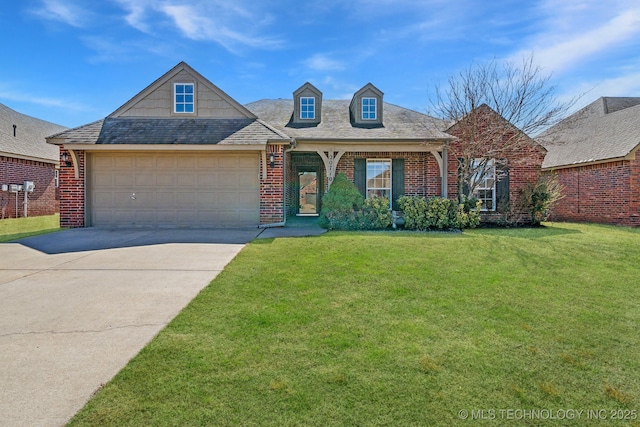 view of front facade with brick siding, a front lawn, roof with shingles, a garage, and driveway