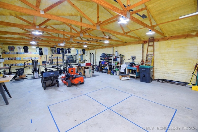 garage featuring a workshop area