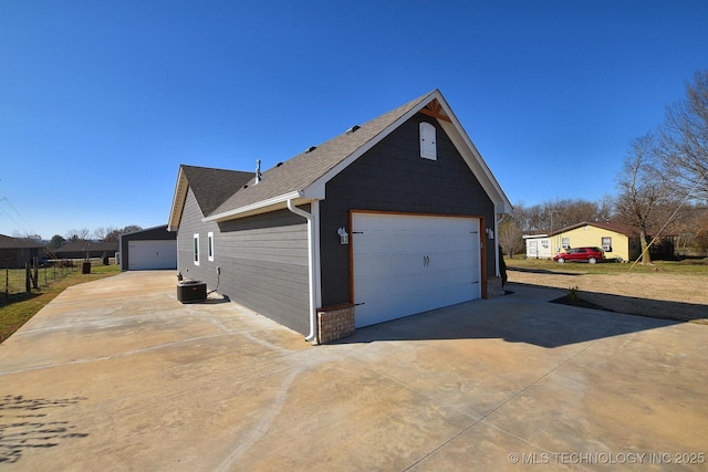 garage featuring central AC unit