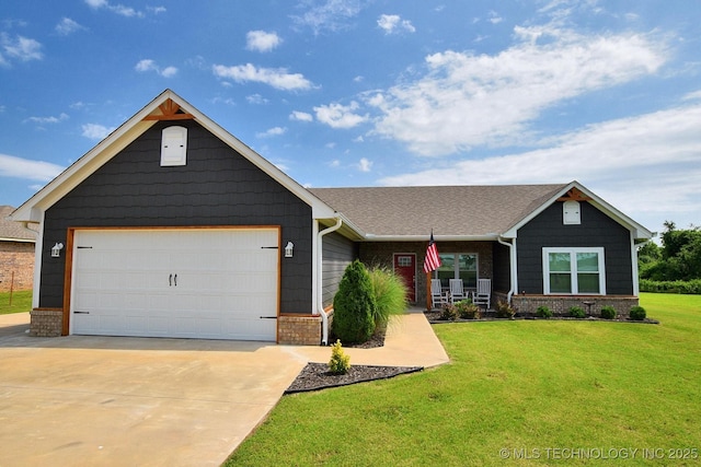 216 E Willis Rd, Tahlequah, OK 74464 - view of front of house featuring brick siding, a front yard, covered porch, driveway, and a garage