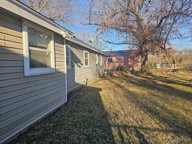 view of yard with central AC unit