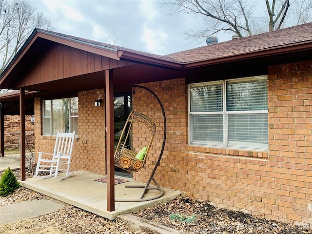 view of patio featuring a porch