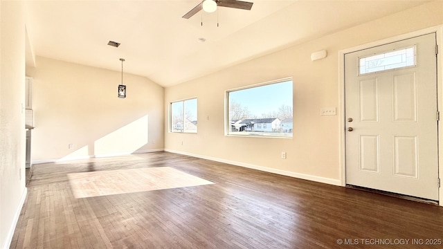 entrance foyer with visible vents, wood finished floors, baseboards, lofted ceiling, and ceiling fan