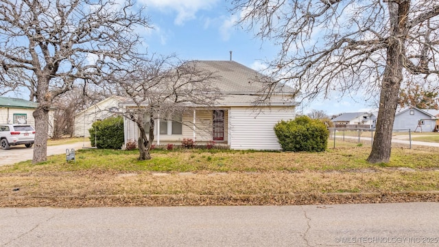 view of front of home with fence