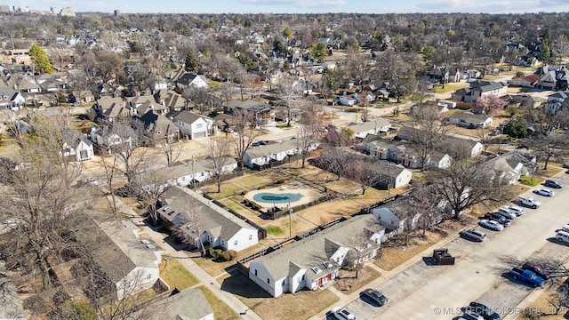 birds eye view of property with a residential view