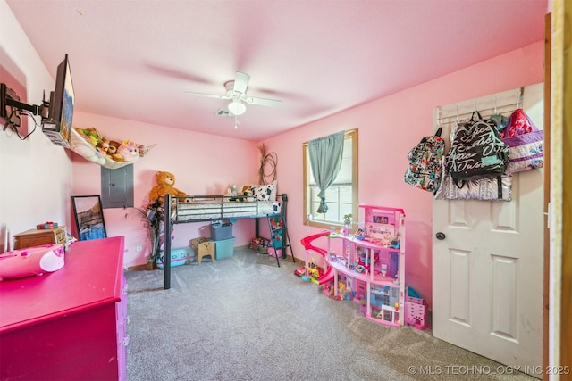 carpeted bedroom with electric panel and ceiling fan