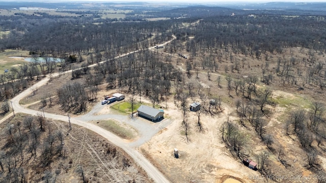 aerial view with a rural view and a forest view