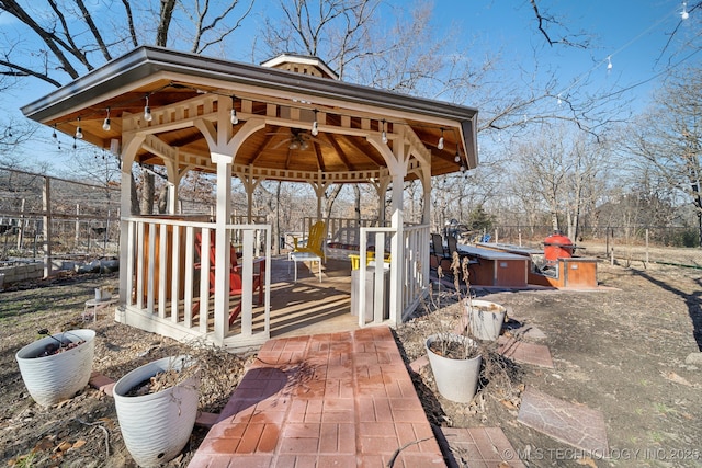 view of patio / terrace with a gazebo and fence