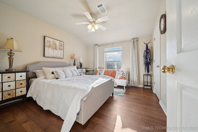 bedroom featuring visible vents, dark wood-type flooring, baseboards, vaulted ceiling, and a ceiling fan