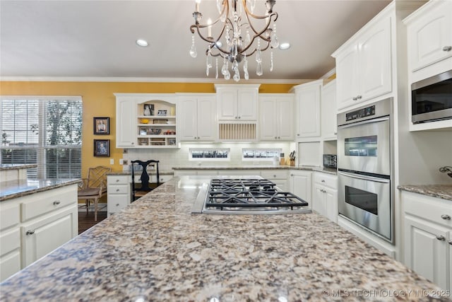 kitchen featuring ornamental molding, open shelves, stainless steel appliances, white cabinets, and decorative backsplash