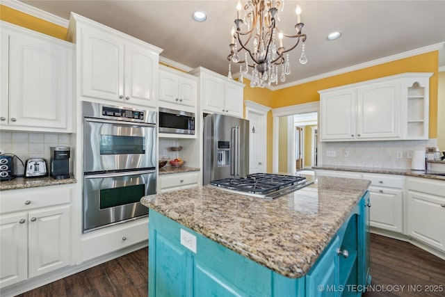 kitchen with ornamental molding, open shelves, dark wood-style floors, white cabinetry, and appliances with stainless steel finishes