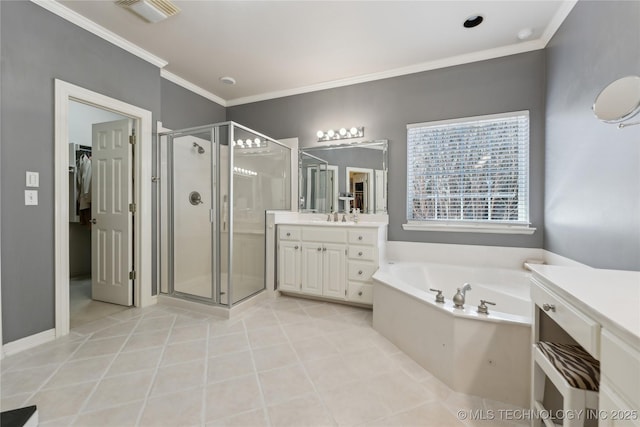 bathroom featuring vanity, visible vents, a shower stall, crown molding, and a bath