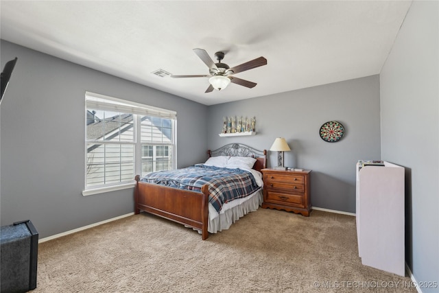 bedroom with a ceiling fan, visible vents, carpet, and baseboards