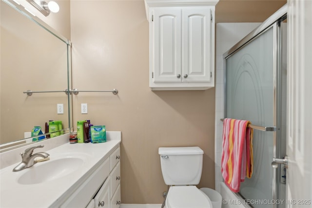 full bathroom featuring toilet and vanity