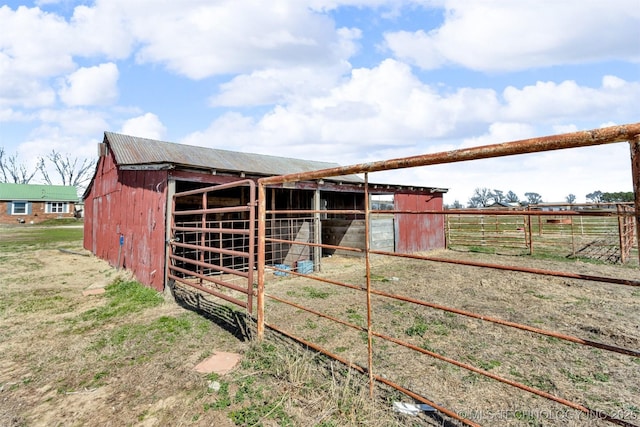 view of outbuilding with an outbuilding and an exterior structure