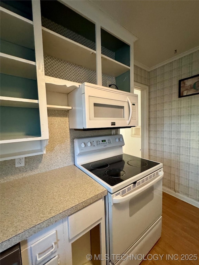 kitchen with white appliances, wallpapered walls, crown molding, and open shelves