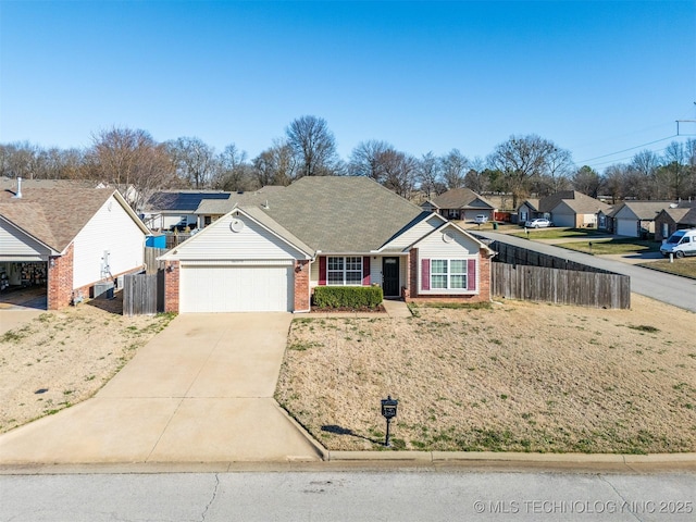 ranch-style house featuring an attached garage, fence, brick siding, and driveway