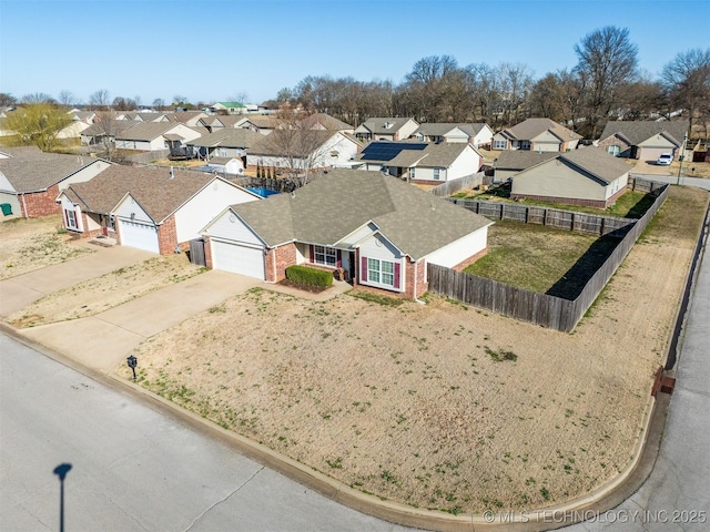 drone / aerial view with a residential view