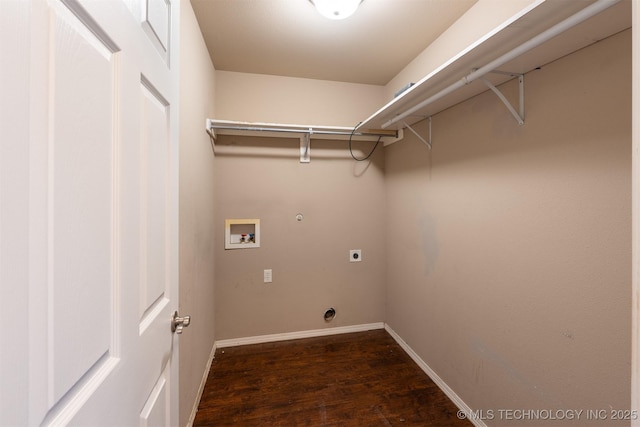 laundry room with electric dryer hookup, washer hookup, wood finished floors, baseboards, and laundry area