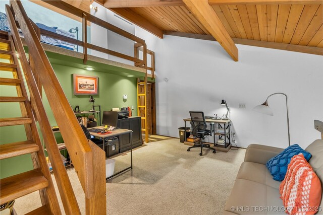 office area featuring beam ceiling, wooden ceiling, and carpet