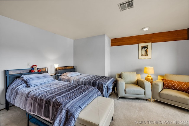 carpeted bedroom with visible vents