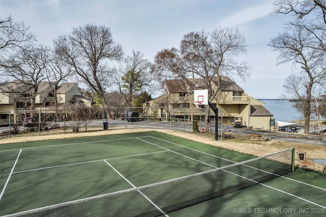 view of sport court with community basketball court and fence