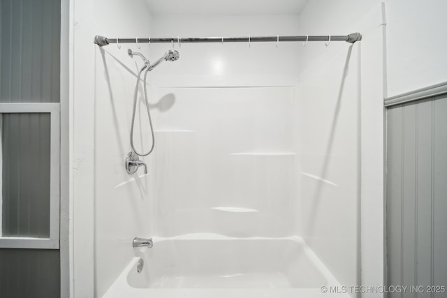 bathroom with shower / bathtub combination