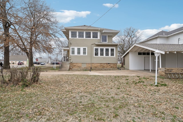 back of house with crawl space