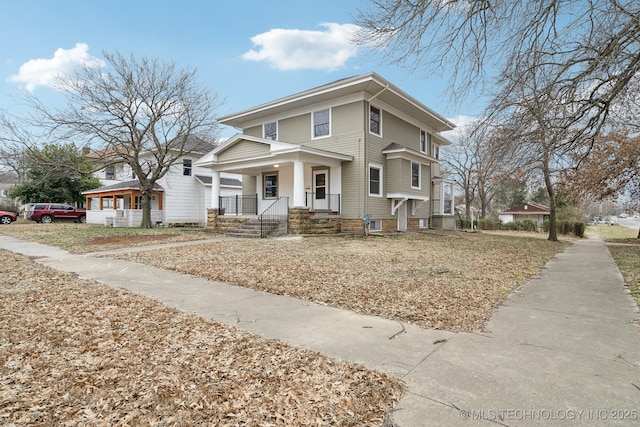 traditional style home with covered porch