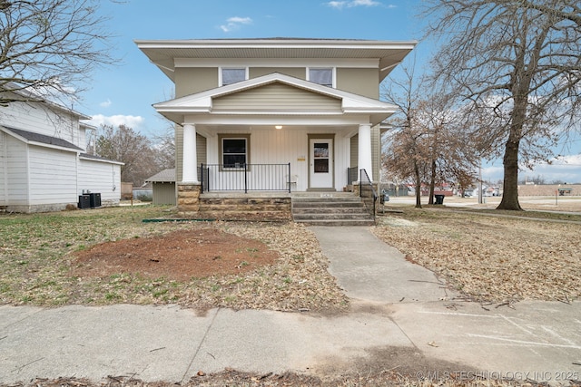 view of front of property with central AC unit and a porch