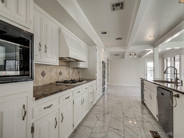 kitchen featuring black microwave, white gas cooktop, dishwasher, marble finish floor, and a sink