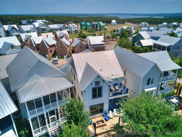 birds eye view of property with a residential view