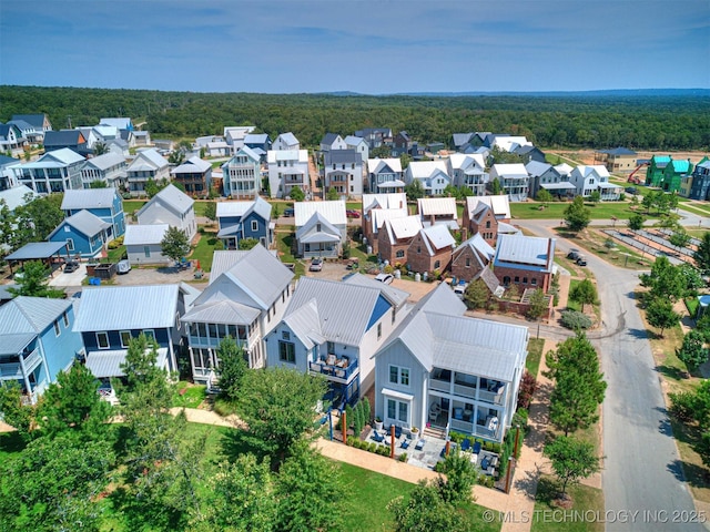 birds eye view of property with a residential view