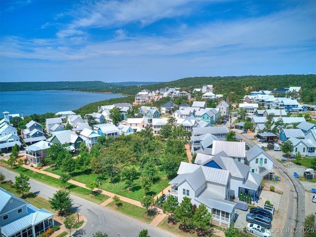 aerial view featuring a residential view and a water view